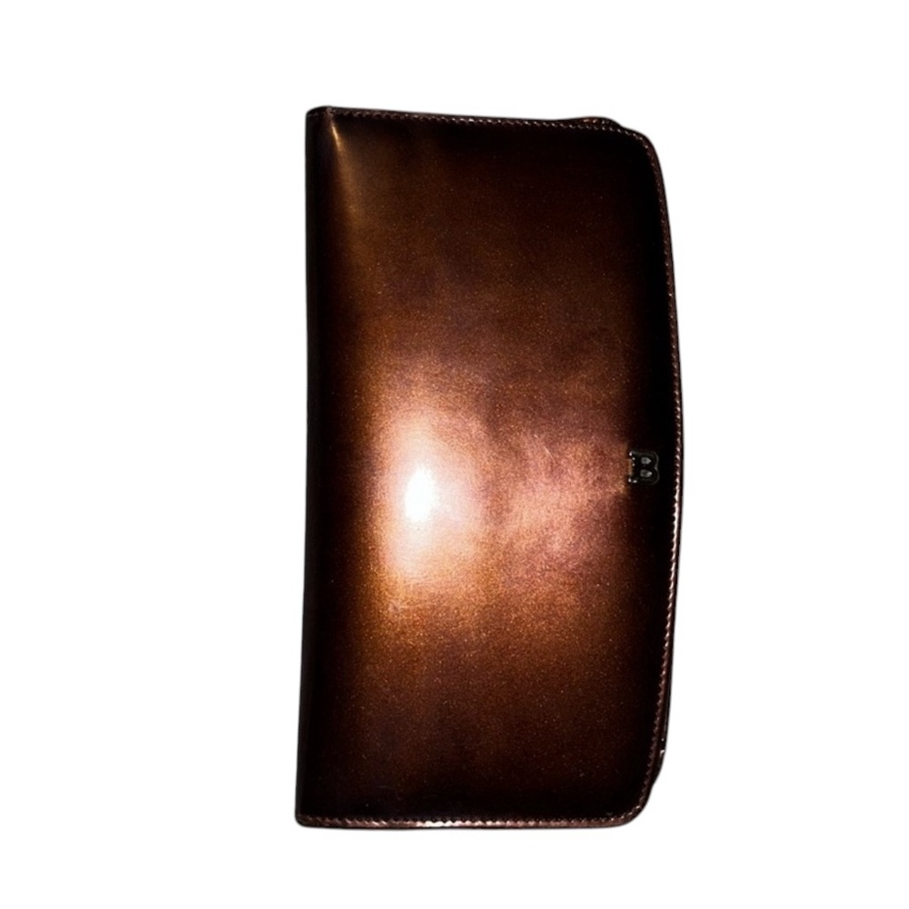 EC🤩BALLY WALLET TWIST. LOCK LIKE NEW, Wine/Plum Color Wallet with a Kiss Lock.